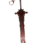 Mini réplique de l'épée Mort du Loup, inspirée de Genshin Impact, exposée sur un support noir. Cette épée imposante arbore une lame noire et rouge aux motifs acérés et tranchants, évoquant la puissance des loups. Une chaîne et un anneau métallique sont fixés à la poignée, en faisant un porte-clés de collection parfait pour les fans du jeu.